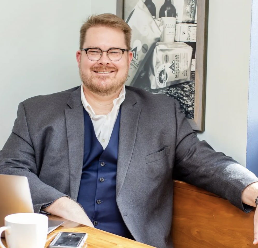 greg beck smiling for portrait 