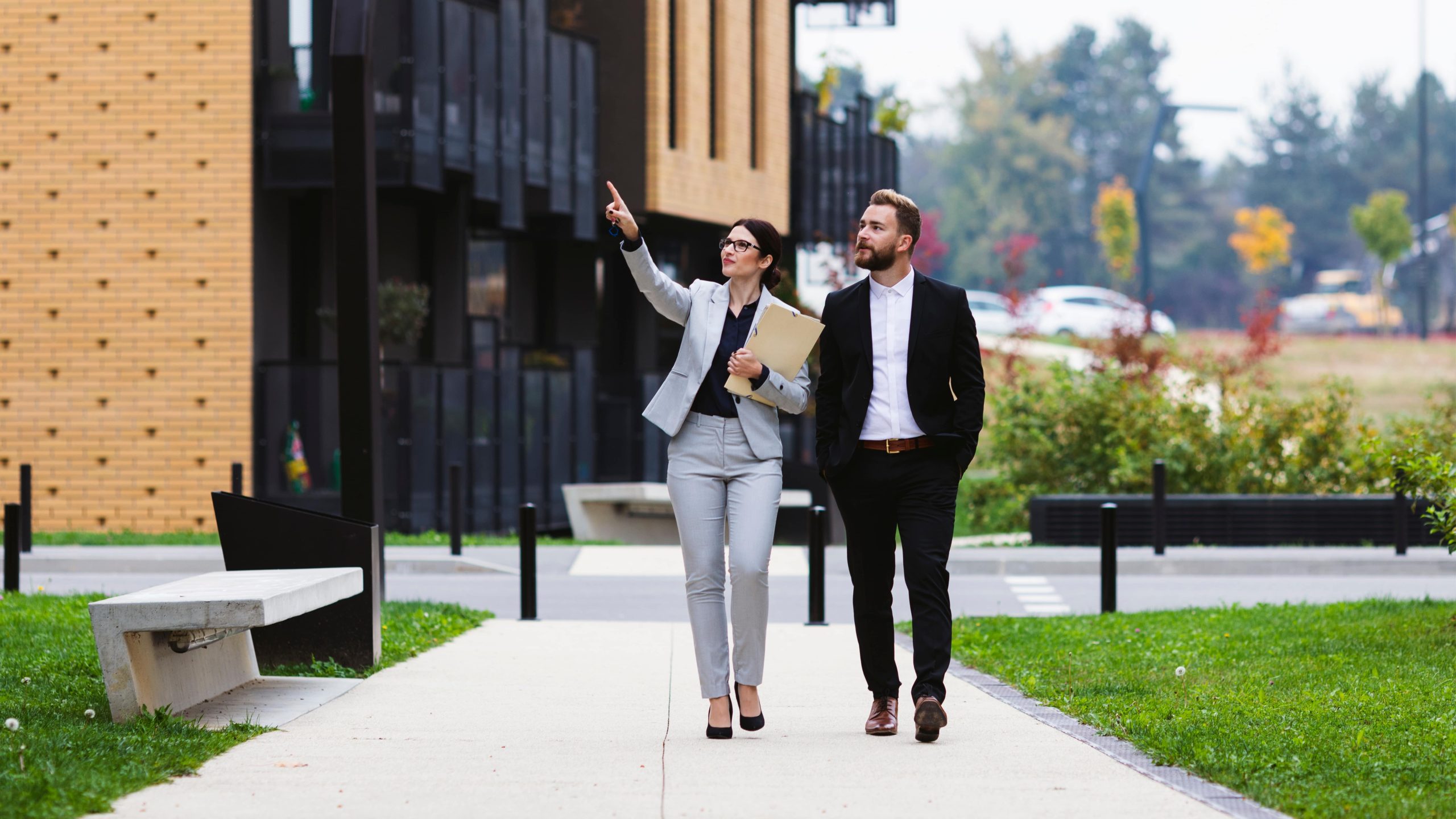 two business brokers walking