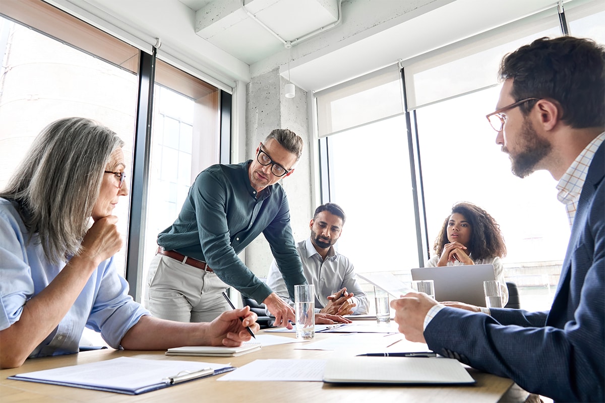 entrepreneurs discussing information during meeting