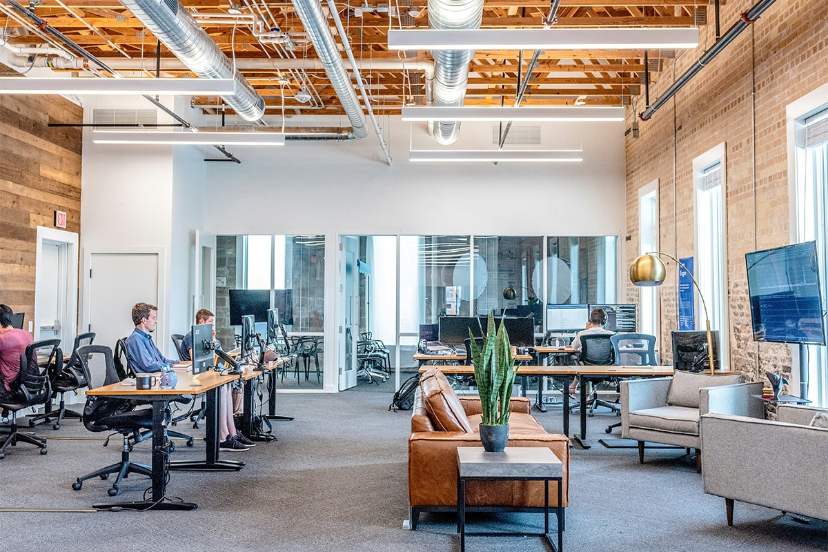 Business office with workers at desks