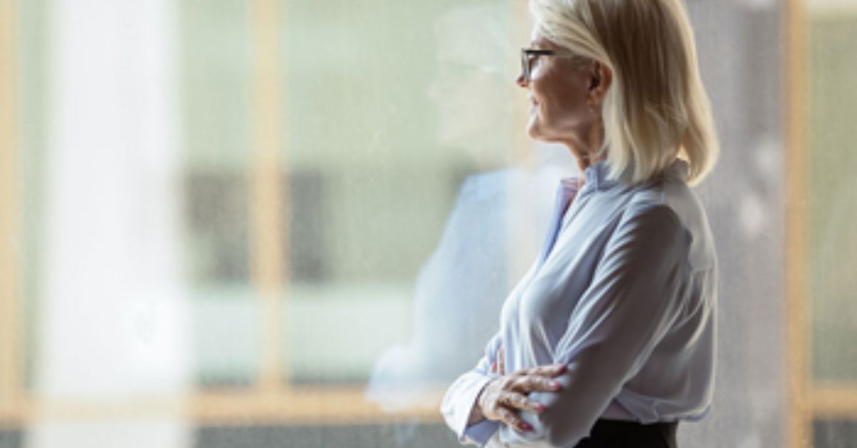 Woman looking out the glass