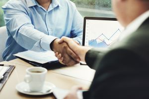 two business people shaking hands