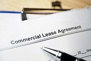 commercial lease agreement on clipboard