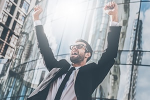 Man celebrates a new business launch.