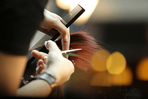 hairdresser cutting hair
