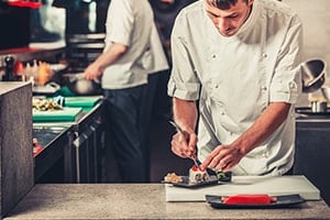 chef preparing sushi