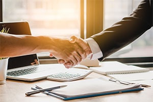 two business people shaking hands