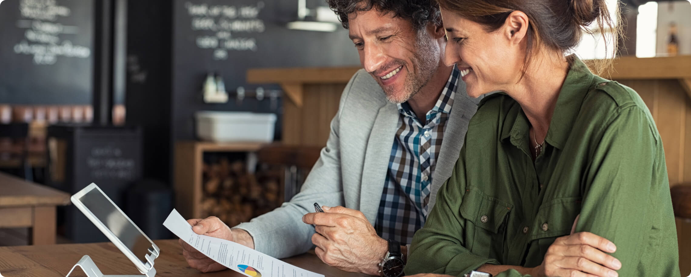 two business owners going over paperwork