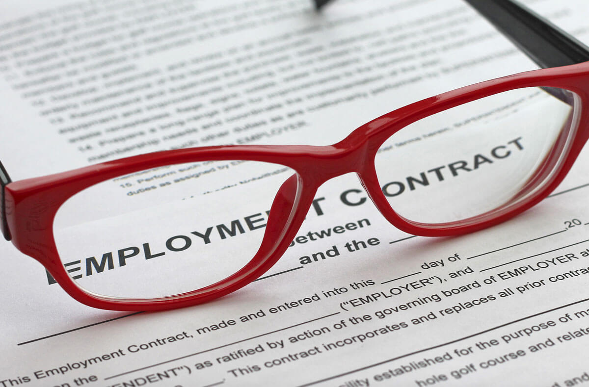 close-up of employment contract paperwork