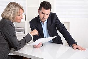 potential buyer reviewing a business's balance sheet
