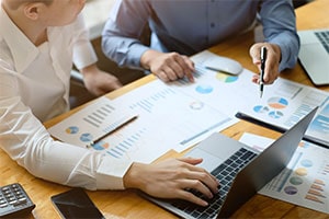 owner of a failing business meeting with prospective buyer